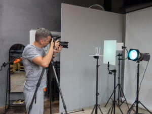 photographer shooting product in studio