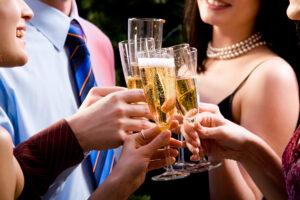 group of people with champagne toasting