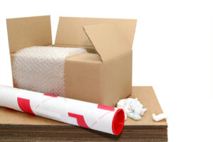 Shipping stuff - cardboard cartons, tube, bubble wrap, styrofoam packing peanuts.